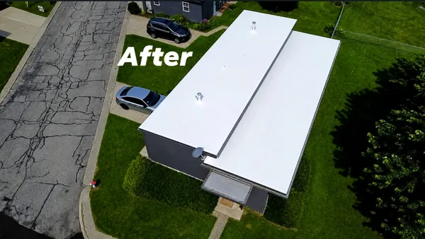 Aerial view of completed residential 50 mil membrane roof replacement in South Bend
